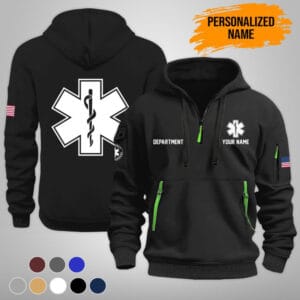 Front view of a black star of life job shirt featuring a quarter-zip, green accents, and personalized paramedic chest text.