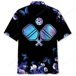 Back view of a black pickleball shirt with vibrant floral designs and paddles, perfect for casual wear.