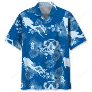 Front view of a blue scuba diving shirt with tropical patterns, featuring divers and snorkeling gear.