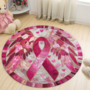 Close-up view of the breast cancer ribbon rug featuring detailed pink ribbon and heart designs.