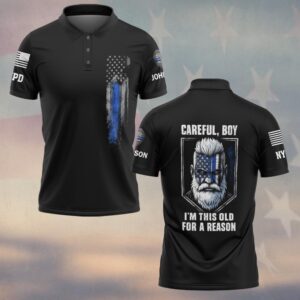 Front view of the Careful Boy police polo in black, featuring a blue line design and American flag accents.
