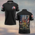 Front view of black never forget 911 polo featuring a chest maltese cross logo with twin towers and US flag sleeve detail.