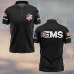 Front view of the patriotic star of life EMS polo in black with vibrant logo and flag details.