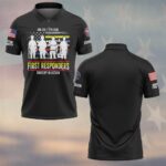 Front view of black bravery in action polo featuring first responder silhouettes and distressed USA flag graphic.
