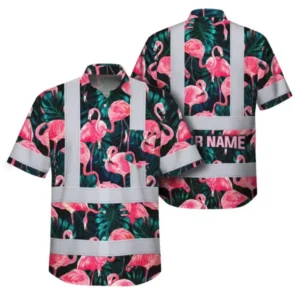 Front and back of a dark flamingo safety shirt with pink birds, green tropical leaves, reflective tape, and custom name.