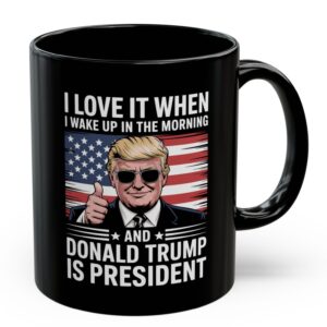 Front view of the black 11oz mug featuring the 'I love it when Trump is president' design.