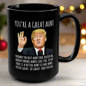 Front view of the you're a great aunt mug, featuring a humorous design on a sleek black ceramic surface.
