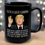 Front view of a black mug featuring the phrase 'you’re a great grandma mug' with a humorous design.