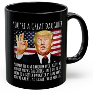 Front view of the you're a great daughter mug showcasing a colorful design against a black background.