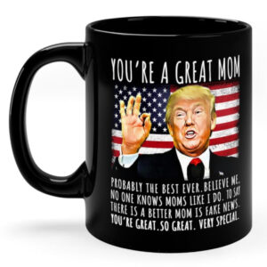 Front view of the you're a great mom mug featuring bold text and a colorful design on a black background.