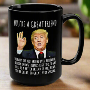 Front view of the you're a great friend mug featuring a humorous design on a black ceramic surface.