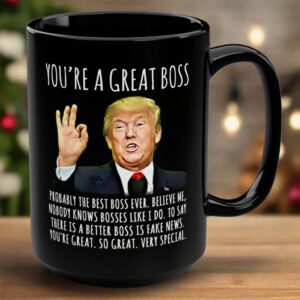 Front view of the black mug featuring 'you're a great boss mug' text and a humorous design.