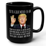 Front view of the you're a great mother-in-law mug in black with a humorous Trump design.