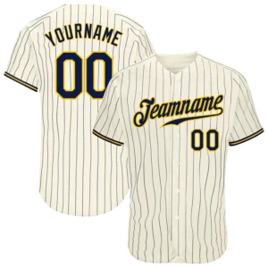 Front view of cream navy pinstripe baseball jersey showcasing bold team logo and vibrant gold details.