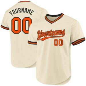 Front view of the cream orange black baseball jersey showcasing the stylish team logo and vibrant colors.