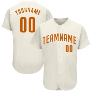 Front view of the cream Texas orange authentic baseball jersey, featuring bold lettering and buttons.