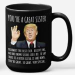 Front view of the you're a great sister mug featuring humorous text and a vibrant design in black.
