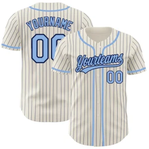 Home Front view of the cream navy pinstripe baseball jersey with light blue accents and team name.