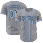 Front view of gray black pinstripe light blue baseball jersey featuring team name and number.