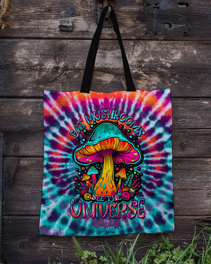 Eat Mushrooms See The Universe Tote Bag Front view of the eat mushrooms see the universe tote bag featuring vibrant tie-dye colors and a colorful mushroom design.