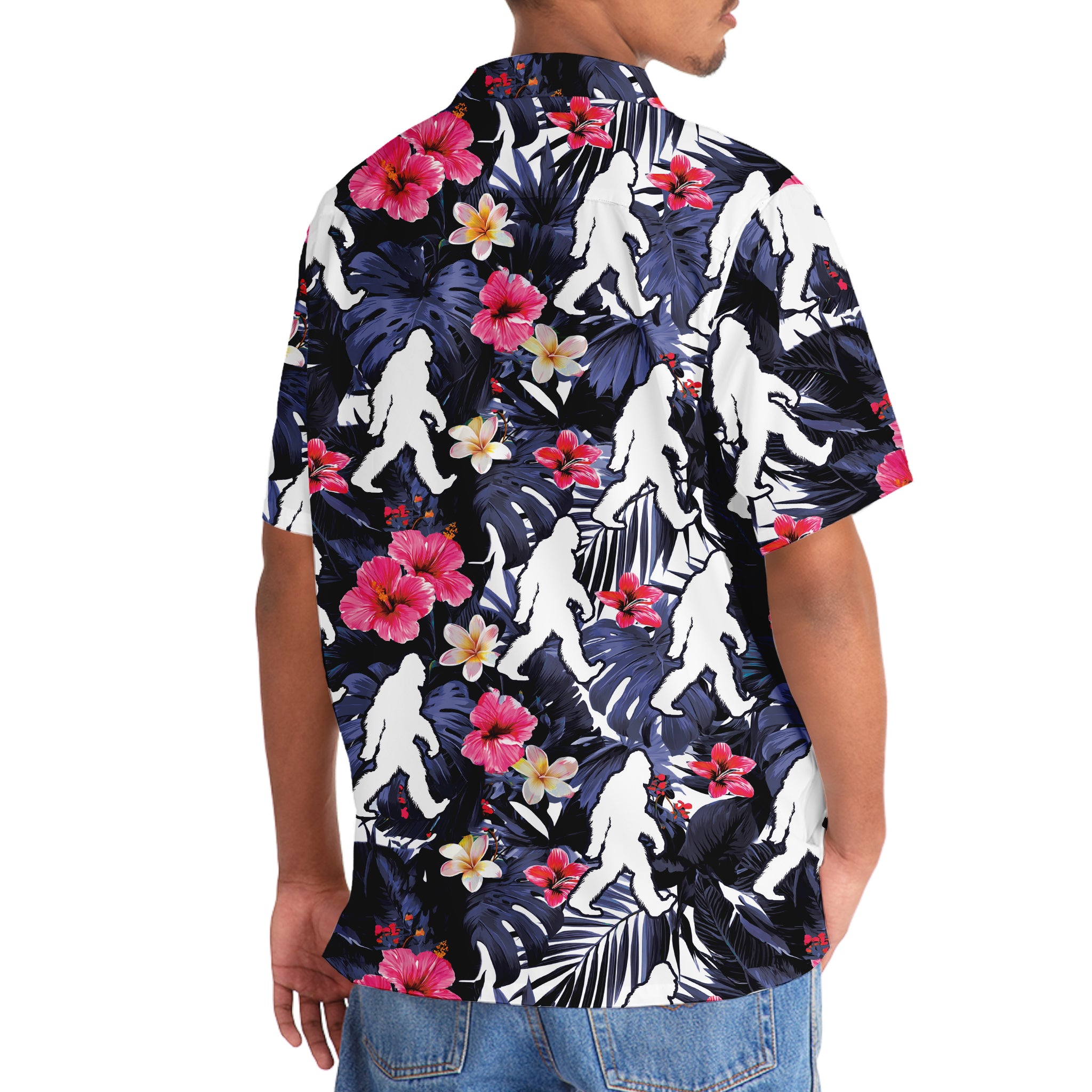 Tropical Bigfoot Walking Hawaiian Shirt Flat lay of the tropical bigfoot walking Hawaiian shirt with accessories, emphasizing its fun and playful vibe.