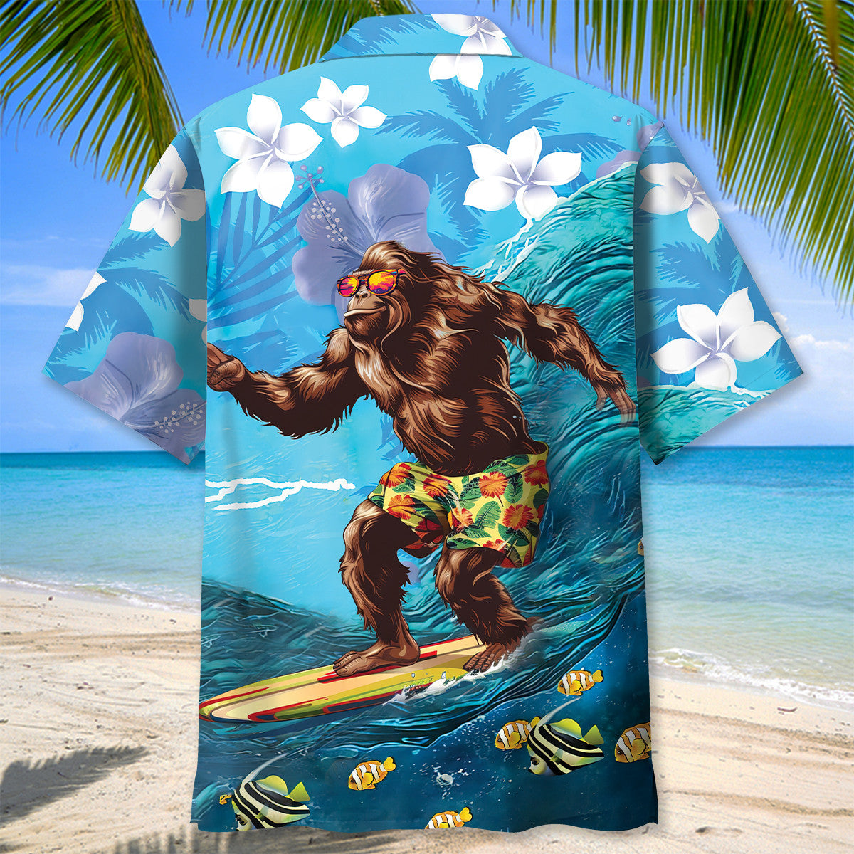 Bigfoot Surfing Hibiscus Hawaiian Shirt Lifestyle shot of a person wearing the bigfoot surfing hibiscus Hawaiian shirt at the beach, enjoying the sun.