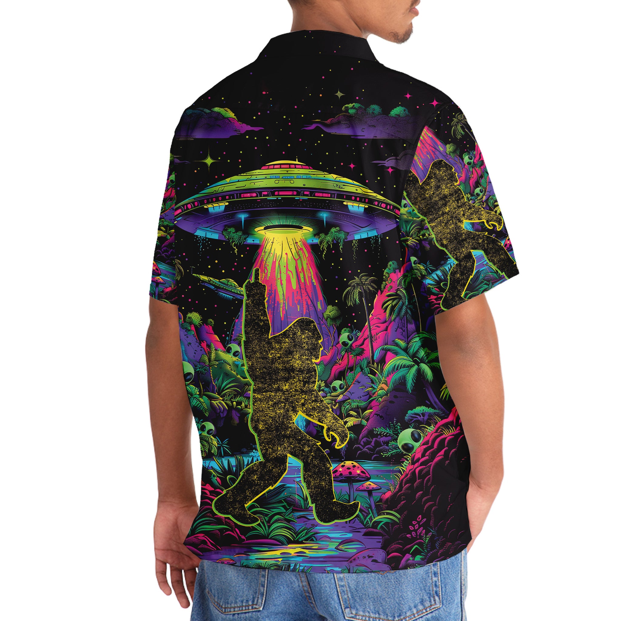 Alien Bigfoot Night Hawaiian Shirt Side angle of the alien bigfoot night shirt, displaying the intricate illustrations of Bigfoot and the UFO in the night sky.