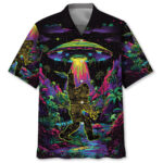Front view of the vibrant alien bigfoot night shirt featuring a colorful design with a UFO and tropical elements.