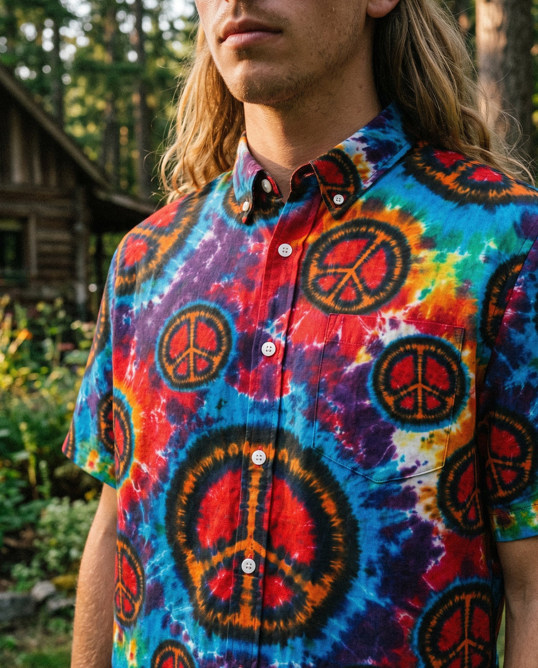 Rainbow Peace Burst Button-Down Collar Shirt Flat lay of the rainbow peace burst button-down shirt displaying its colorful peace sign motifs.