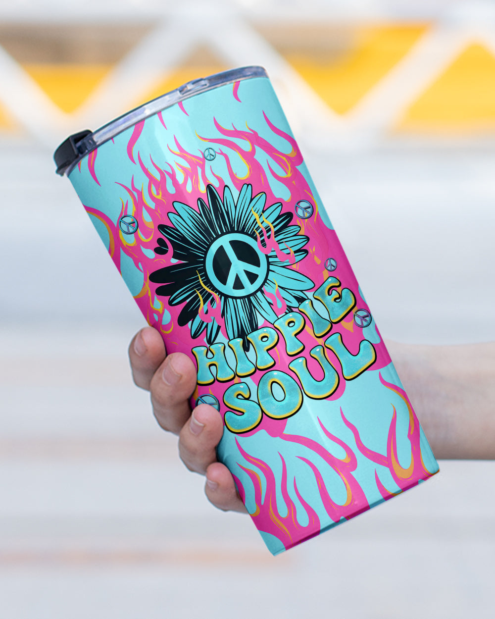 Hippie Soul Flower Tumbler | Vibrant Peace Sign Design Side angle of the hippie soul flower tumbler, emphasizing the unique flower and peace symbol amidst a bright, fun pattern.