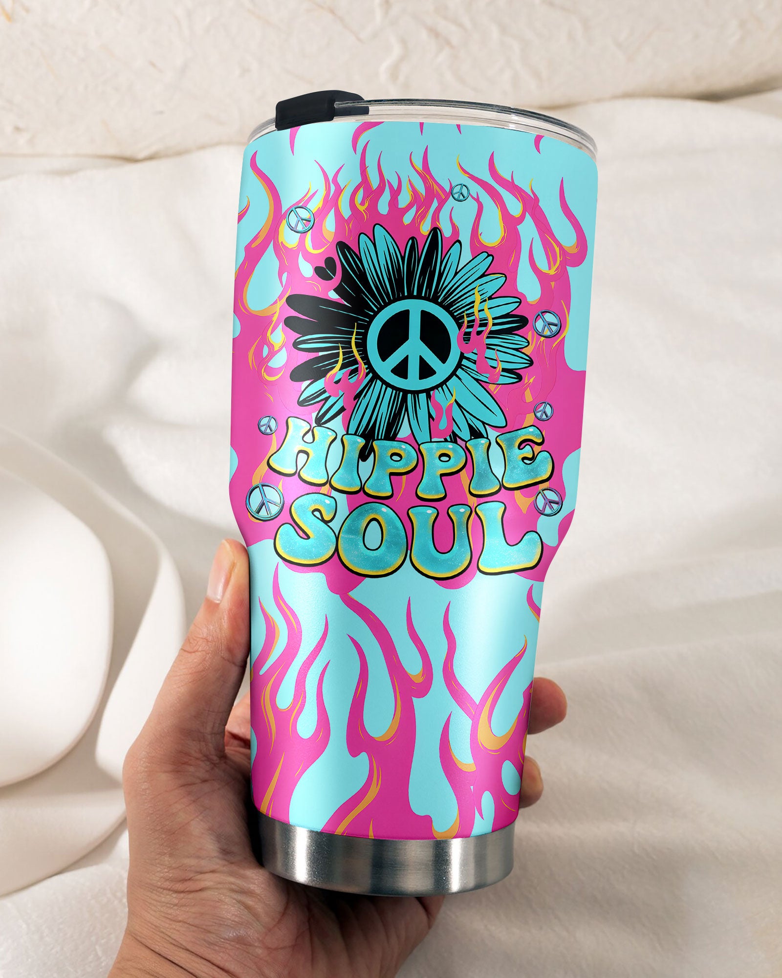 Hippie Soul Flower Tumbler | Vibrant Peace Sign Design Lifestyle shot of a hippie soul flower tumbler on a table, radiating boho vibes with a playful, colorful design.
