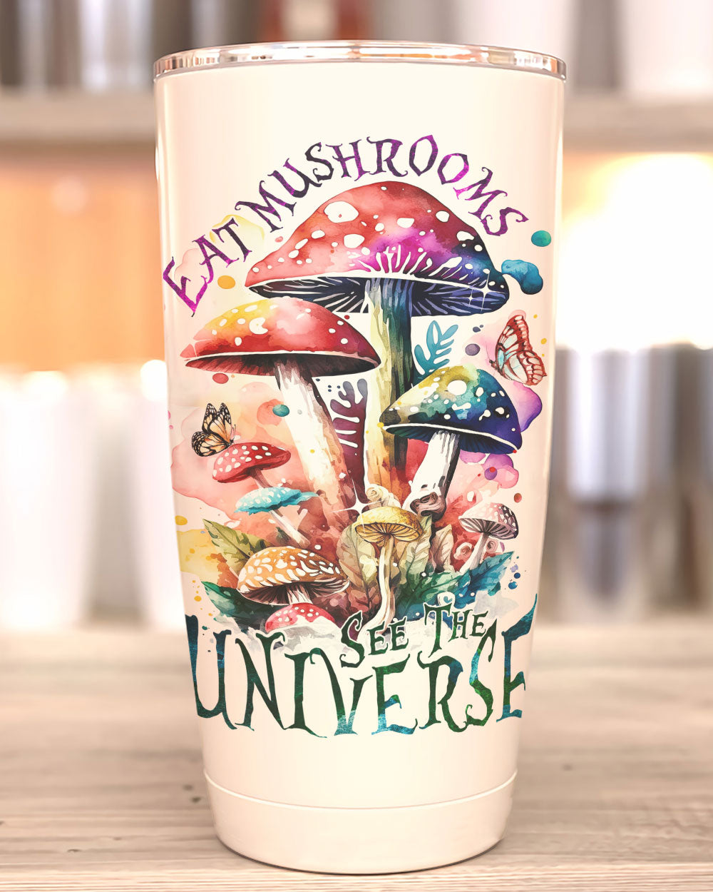 Eat Mushrooms See the Universe Insulated Tumbler Lifestyle shot of the Eat Mushrooms See the Universe tumbler held by a person, perfect for outdoor adventures.