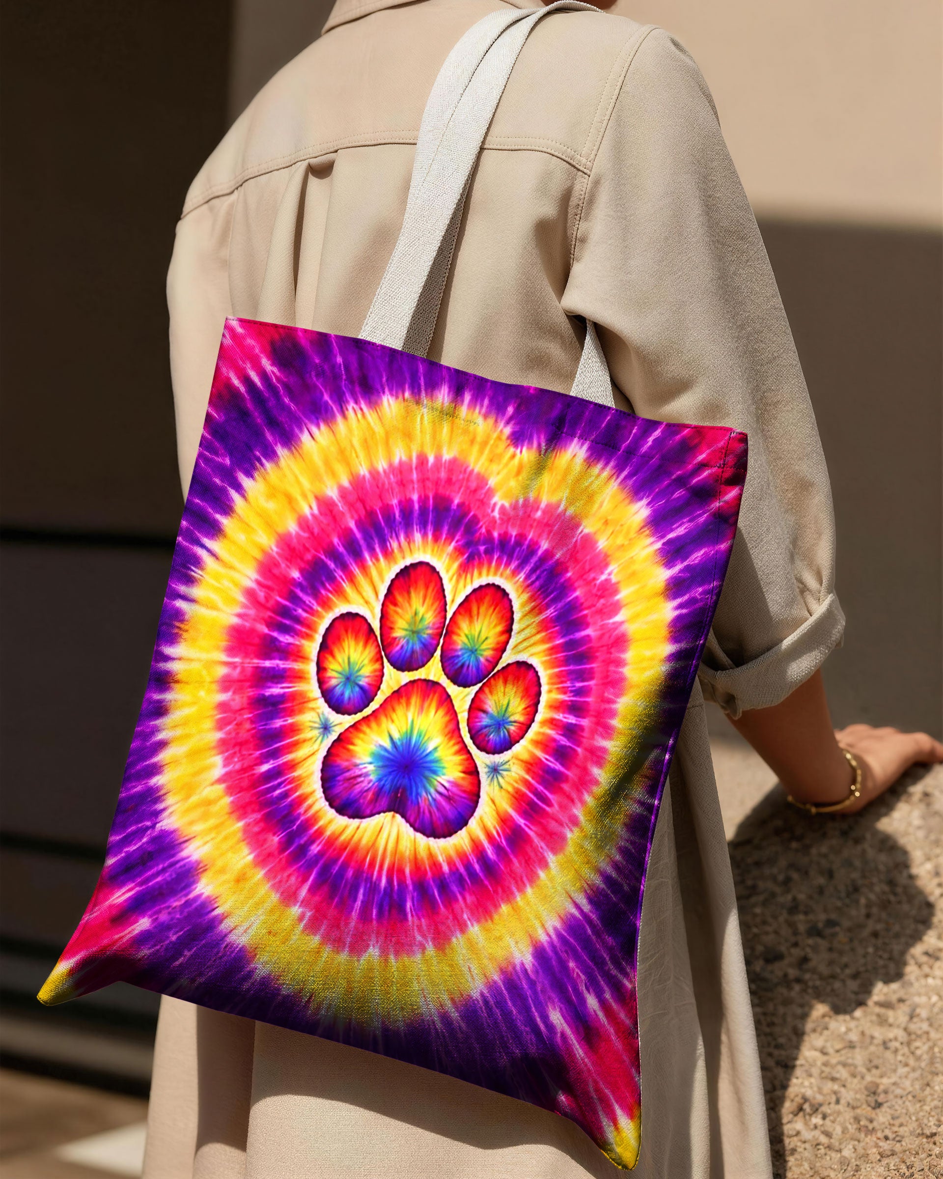 Dog Mama Paw Print Swirl Tote Bag Colorful dog mama paw print swirl tote bag showcased from the back, featuring a vibrant tie-dye pattern.