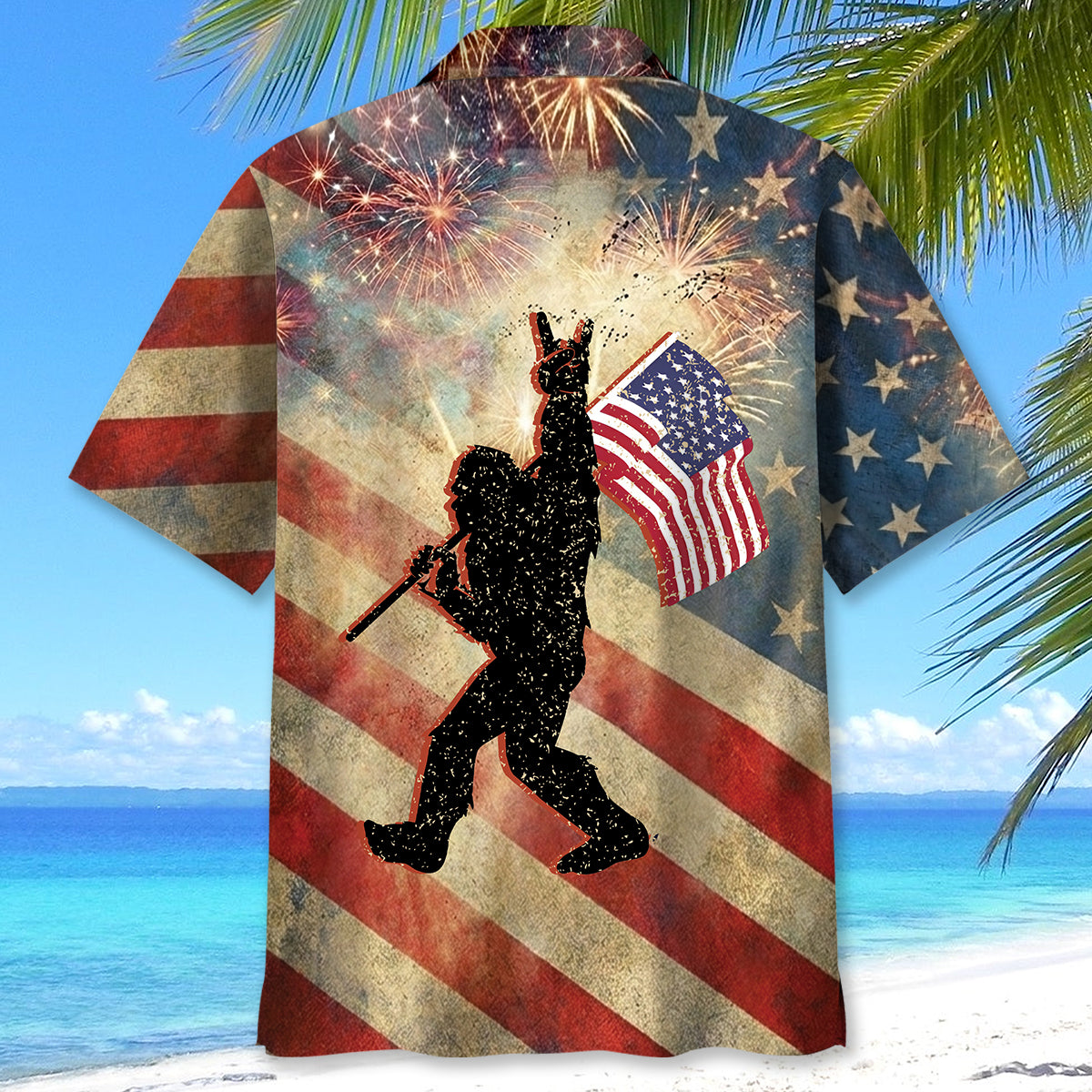 Bigfoot Waving USA Flag Hawaiian Shirt Lifestyle shot of a person wearing the Bigfoot waving USA flag Hawaiian shirt at a summer barbecue.