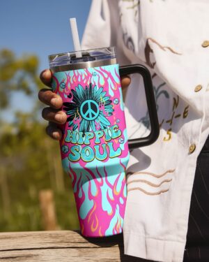 Hippie soul flower tumbler in vibrant colors, featuring a peace sign and floral design, held in a person's hand.