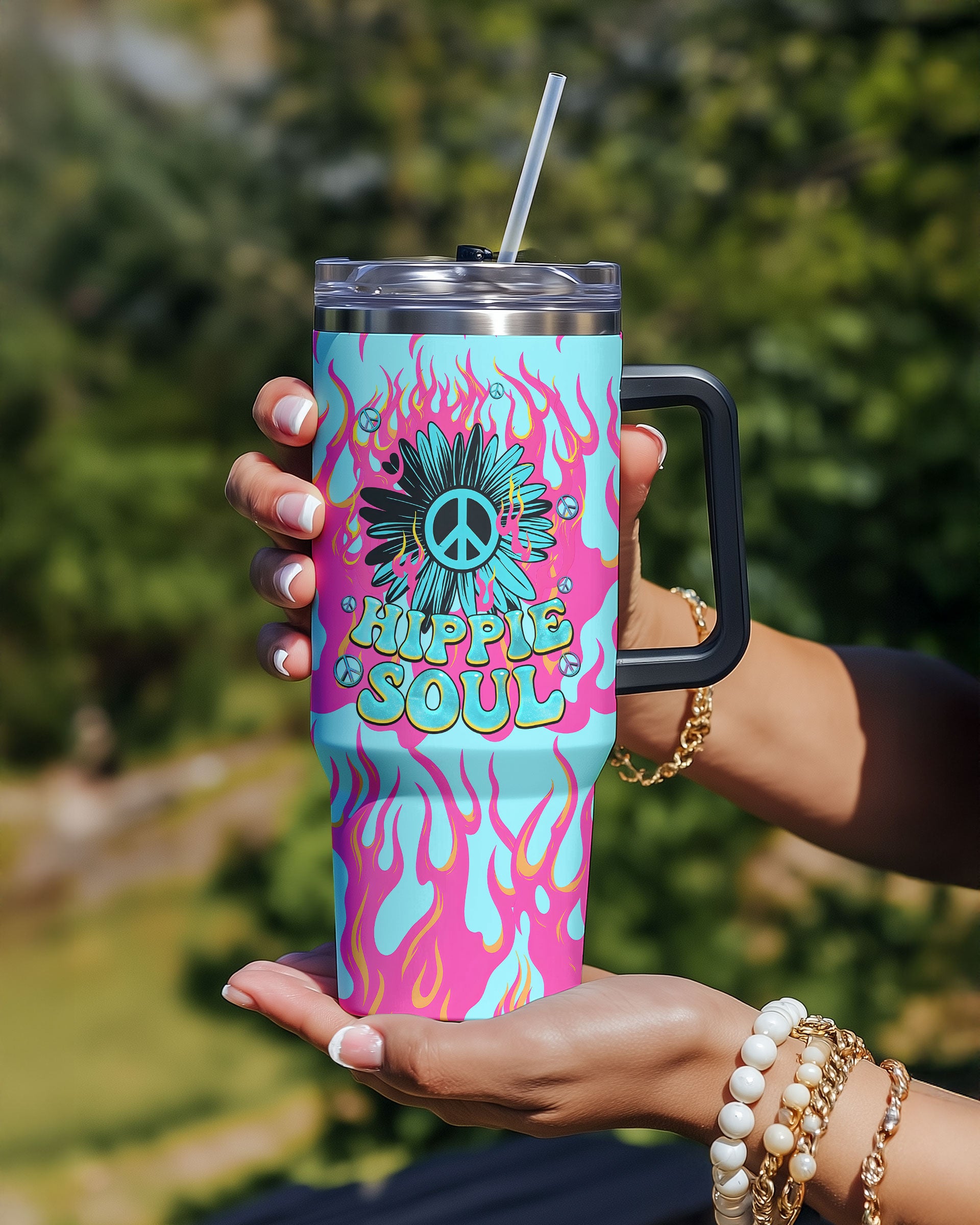 Hippie Soul Flower Tumbler | Vibrant Peace Sign Design Back view of the hippie soul flower tumbler, highlighting its sleek design and colorful graphics against a natural backdrop.