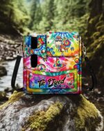 Front view of the I'm The Tie Dyed One tumbler storage bag with vibrant floral patterns.