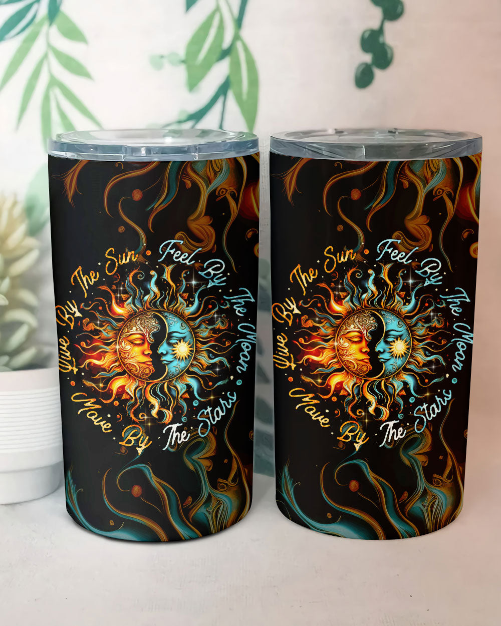 Feel By The Moon Insulated Tumbler | 20oz, 30oz, 40oz Back angle of the 20oz tumbler showcasing the intricate sun and moon artwork with colorful swirls.