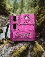 Front view of the pink 'We Wear Pink Boo' tumbler storage bag with ghost design and peace symbols.