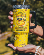 Bright yellow I'M NOT SHORT DUCK HIPPIE TUMBLER held up, featuring a cute duck with sunglasses and floral designs.