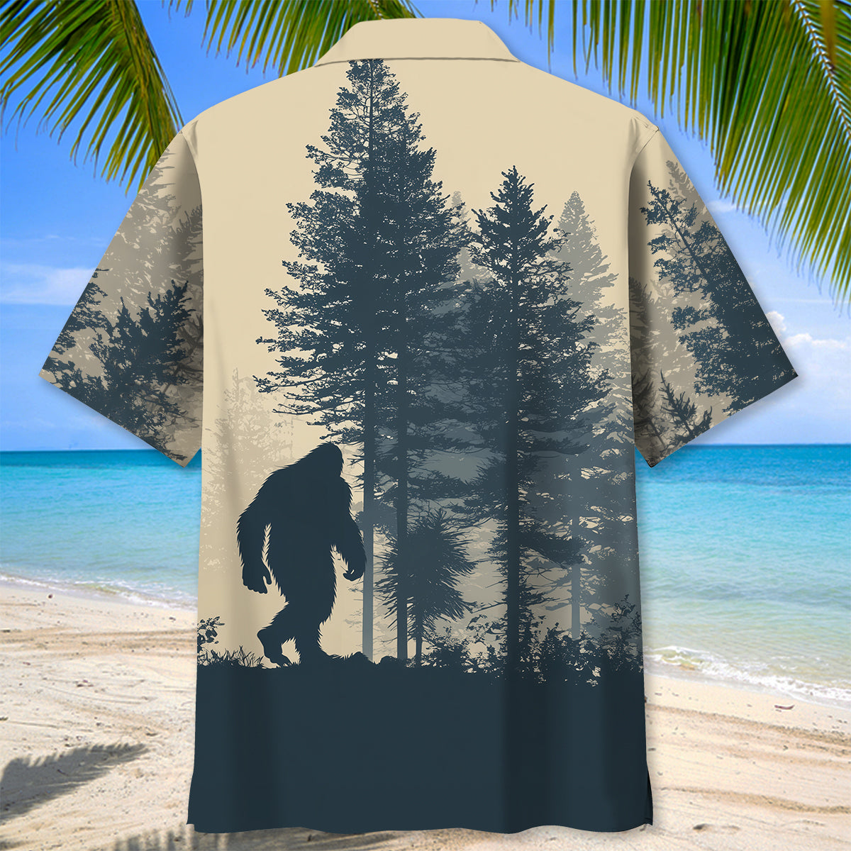 Bigfoot Hide and Seek Hawaiian Shirt Lifestyle shot of a person wearing the Bigfoot Hide and Seek Hawaiian shirt at the beach, enjoying the sun.