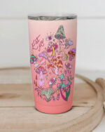 Front view of the Eat Me insulated tumbler, featuring colorful mushroom designs on a pink background.
