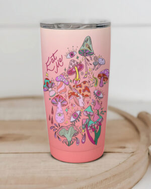 Front view of the Eat Me insulated tumbler, featuring colorful mushroom designs on a pink background.