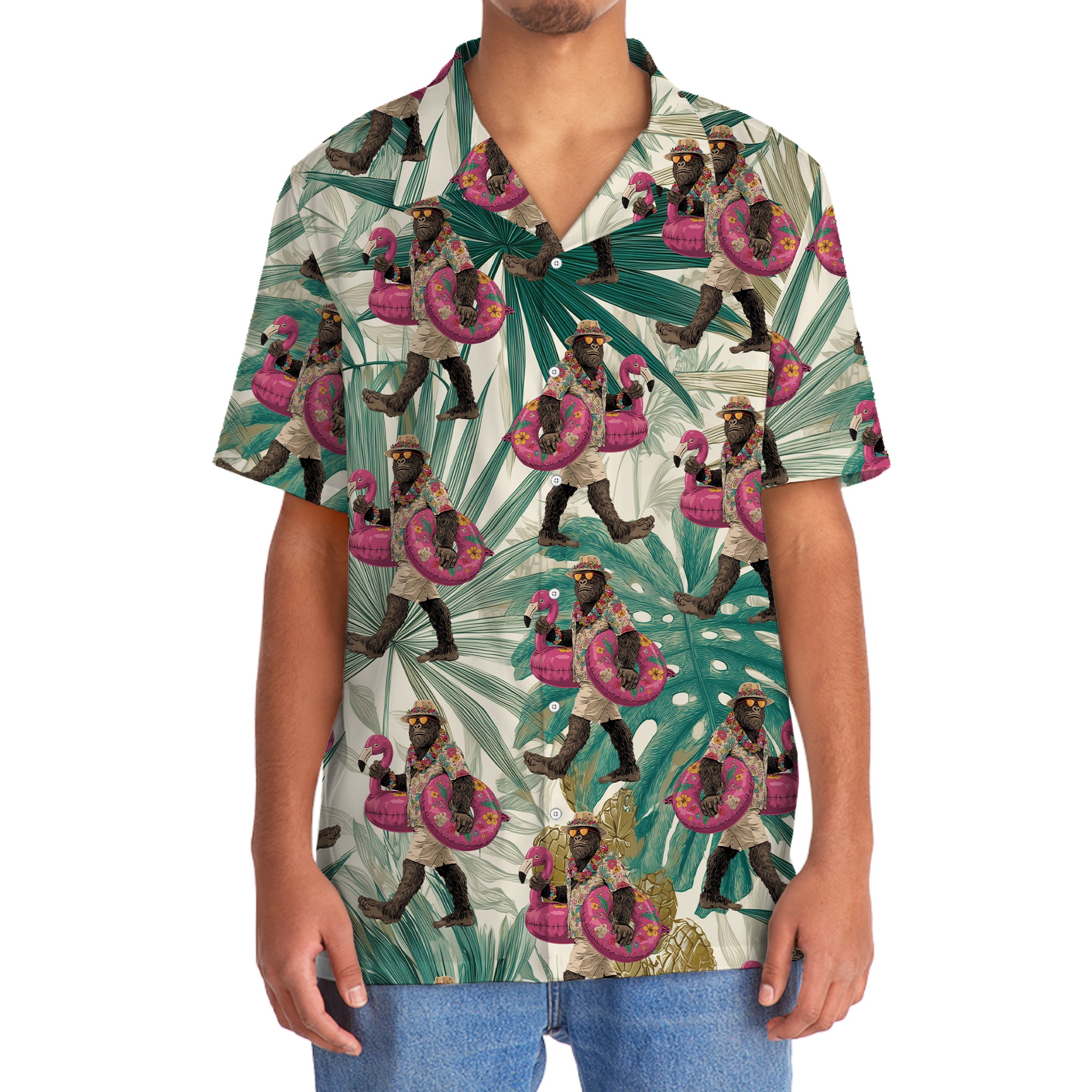 Bigfoot Flamingo Escape Hawaiian Shirt Flat lay of the Bigfoot Flamingo Escape Hawaiian shirt with tropical leaves, perfect for a vacation outfit.