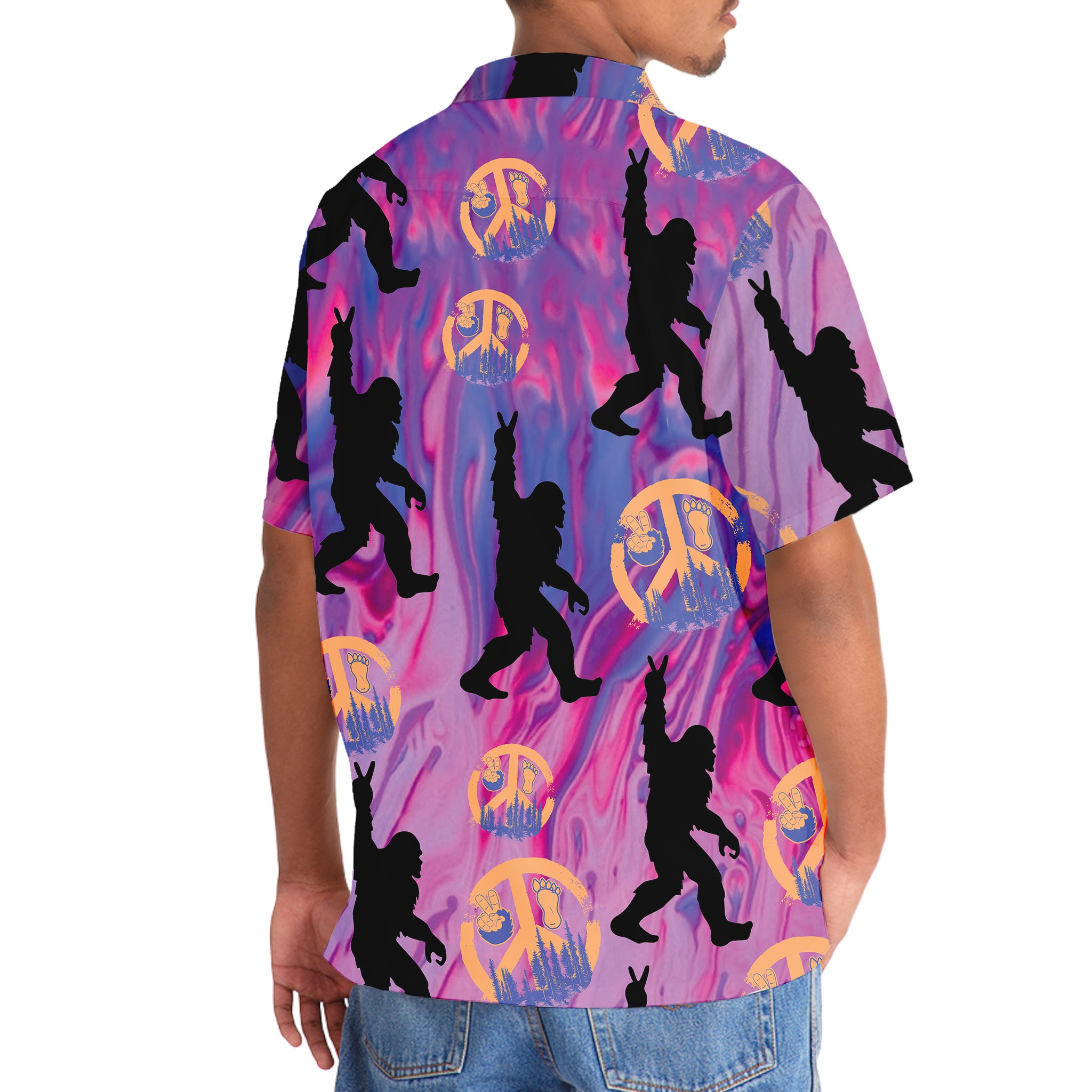 Bigfoot Peace Hand Sign Hawaiian Shirt Flat lay of the bigfoot peace hand sign Hawaiian shirt against a tropical background, perfect for summer outings.
