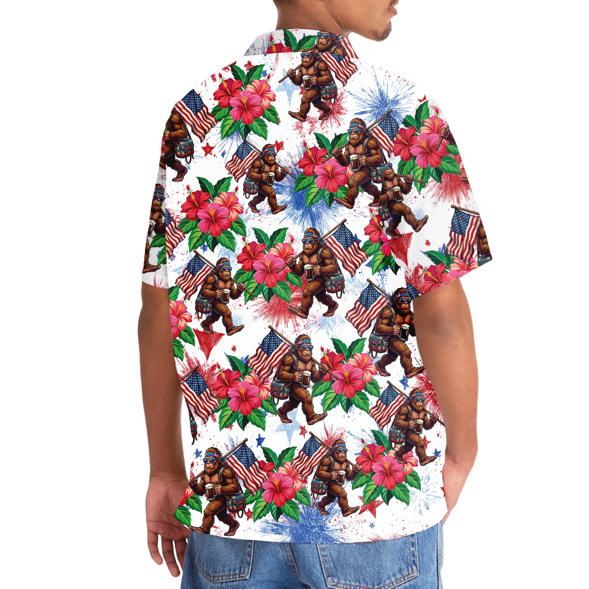 Bigfoot Patriot Tropical Hawaiian Shirt Flat lay of the Bigfoot Patriot Tropical Hawaiian Shirt with tropical flowers and patriotic elements.