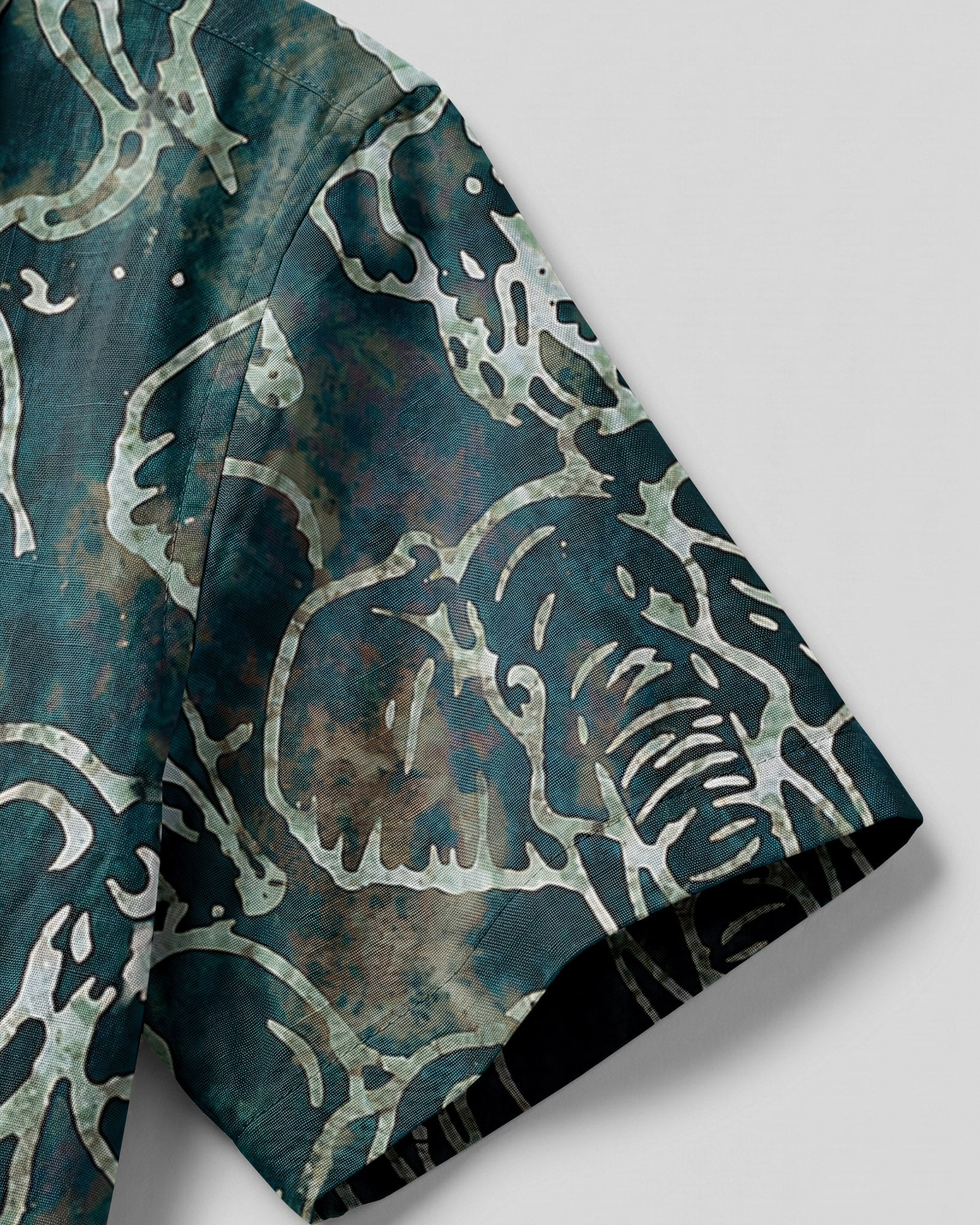 Elephant Pattern Camp Shirt Lifestyle shot of the elephant pattern camp shirt being worn outdoors, perfect for casual summer outings.