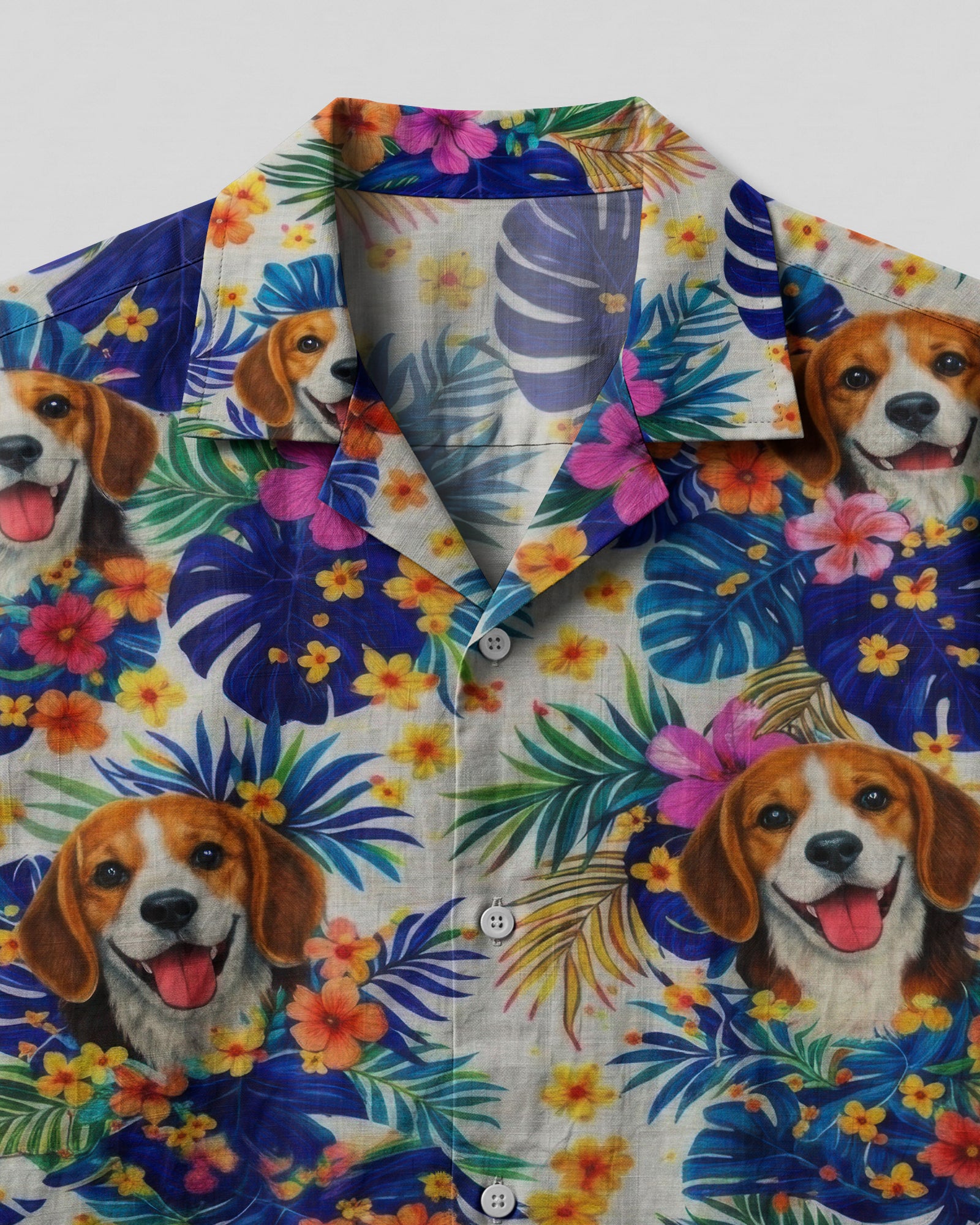 Beagle Tropical Camp Shirt Close-up detail of the beagle tropical camp shirt's fabric highlighting the intricate floral and beagle prints.