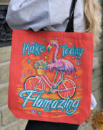 Colorful MAKE TODAY FLAMAZING TOTE BAG featuring a flamingo and bicycle design, viewed from the front.