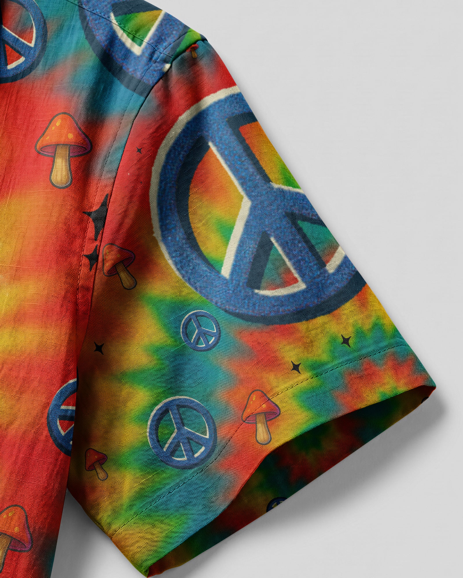 Old Hippies Tie Dye Camp Shirt Lifestyle shot of a person wearing the old hippies tie dye camp shirt at a beach, enjoying a sunny day with friends.